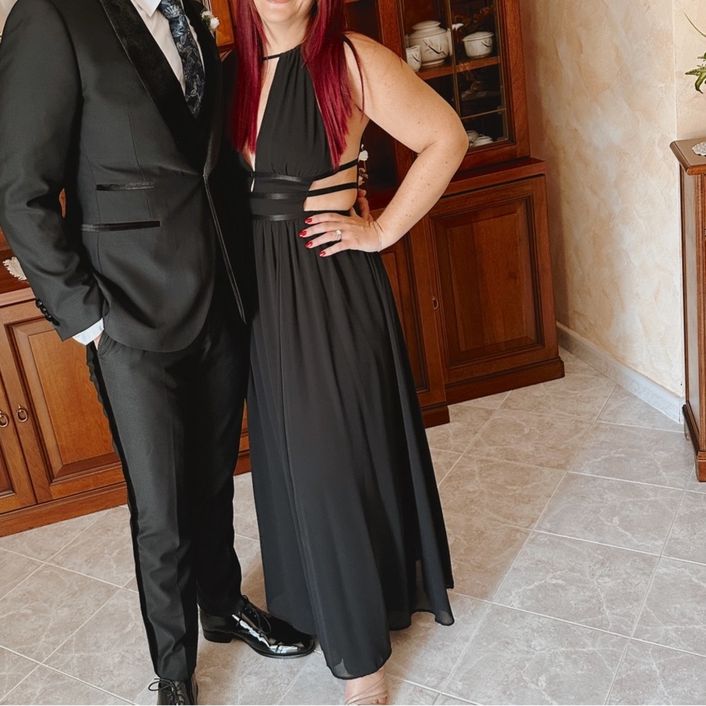 Black spaghetti strap gown with cut outs